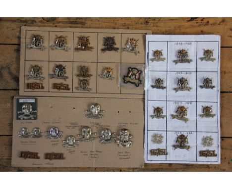 A collection of British Army badges, to include; 17th/21st Lancers, Queens Lancers, Leeds Pals, Tynside Scottish, etc (67 on 