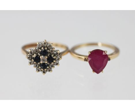 A ruby set dress ring, the pear shaped stone set in 9ct yellow gold and a sapphire set cluster ring, also set in 9ct gold, to