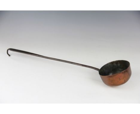 A 19th century copper ladle with wrought iron hook handle, 54cm