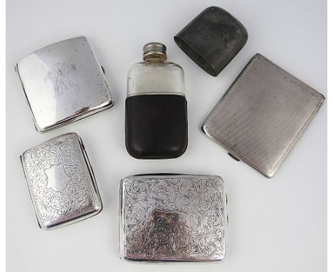 Four silver cigarette cases, the largest with engine turned detailing, Birmingham 1930, and two with engraved foliate detaili