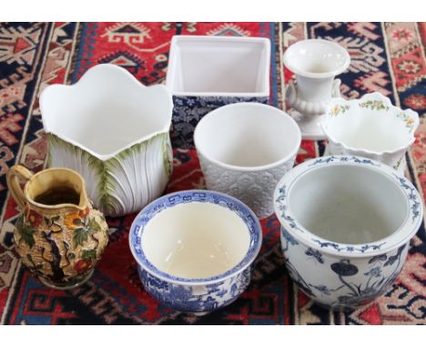 A collection of ceramic jardinieres and planters, to include; a Chinese blue and white style example, Aynsley Cottage Garden,