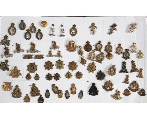 A collection of British Army badges, to include;  Military Police, Veterinary Corps, Parachute Regiment, Gurkha etc (104 on 3