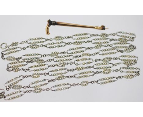 A seed pearl set white metal chain, with lozenge shaped links set throughout with seed pearls, bolt ring clasp, unmarked, wei