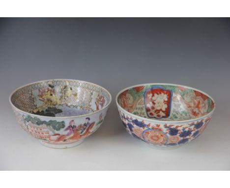 A Chinese famille rose export porcelain punch bowl, 19th century, painted with European figures hunting with black and white 