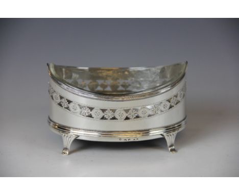 A silver stand, probably Peter and Anne Bateman, London circa 1790, the navette shaped stand with simple stylised foliate ban