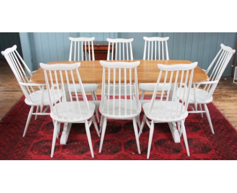 A set of Ercol Goldsmiths Series dining chairs, comprising two carvers and six chairs, each later white painted, lacking badg