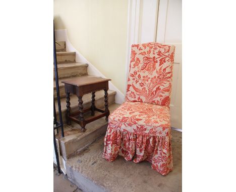 A 17th century style oak joint stool, on barley twist legs, 48cm H x 46cm W, and a chair with terracotta floral loose covers 