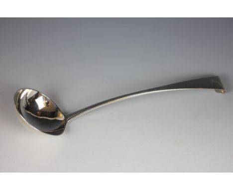 A large Irish silver ladle, Dublin 1758, probably Alexander Richards, engraved crest, 34cm long, weight 7ozt  