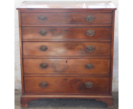 A Regency mahogany and box wood strung chest of five graduated long drawers, each with oval swing handle and raised on four b