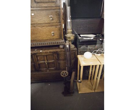 A BRASS PARAFFIN LAMP, A VICTORIAN WOODEN TRIPOD STAND AND A HAND DRILL  