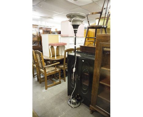 ART DECO BLACK JAPANNED AND SILVERED METAL UPLIGHTER FLOOR LAMP, with three part conical shade and circular, stepped base, 66