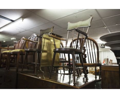 A BRASS FRAMED CHEVAL GRATESCREEN WITH INTAGLIO CUT  MIRROR GLASS PANEL AND AN AMERICAN STYLE STICK BACK OPEN ARMCHAIR WITH C