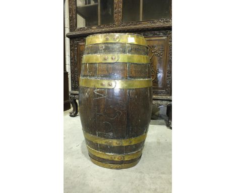 A brass-bound oak coopered-barrel stick stand, 52cm high.