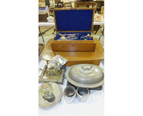 A part-canteen of cutlery contained in a fitted oak box, 36.5cm wide, other cutlery, a silver jam knife, napkin ring, a brass