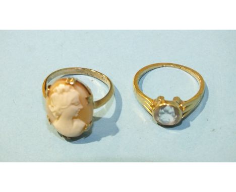 A 9ct gold ring set cameo, size L, 2.8g and an 18ct gold ring set white stone, (a/f), size K, 2.5g, (2).