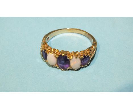 A 9ct gold ring set two opals and three graduated amethysts, size P, 3.6g.