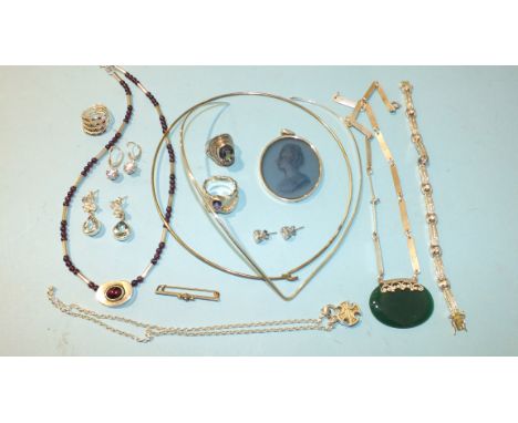 A silver-mounted glass cameo pendant, a silver ring set amethyst, other silver jewellery and a metal torque.