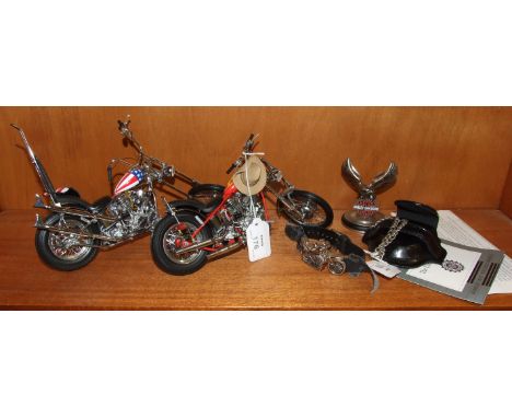 Two Franklin Mint Harley Davidson Chopper motorbike models and other Harley Davidson items.