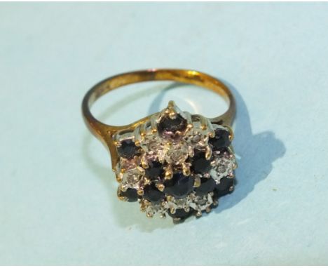 A sapphire and diamond cluster ring in 9ct gold mount, size M, 3.9g.