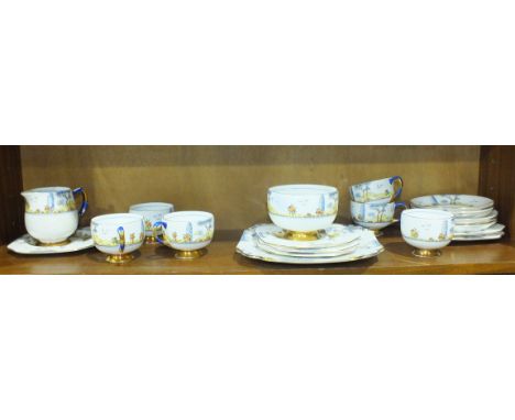 A Carlton China 'Sylvan' decorated tea part-service comprising six cups and saucers, five sandwich plates, a serving plate an