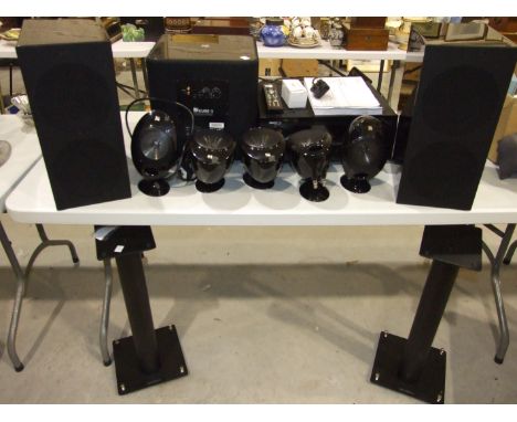 A collection of Hi-Fi and audio equipment, including a Denon AVR surround receiver, a pair of KEF R-3 series floor-standing s
