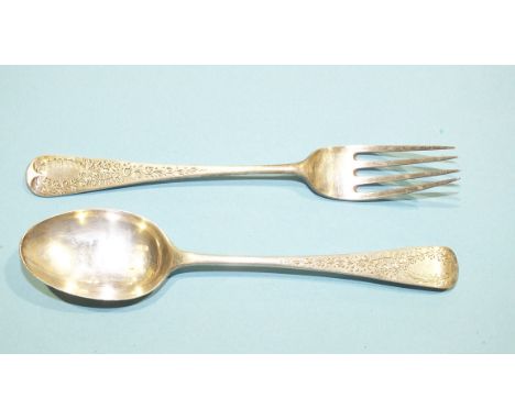 A silver Victorian chutney spoon and fork, London 1886, with engraved decoration.