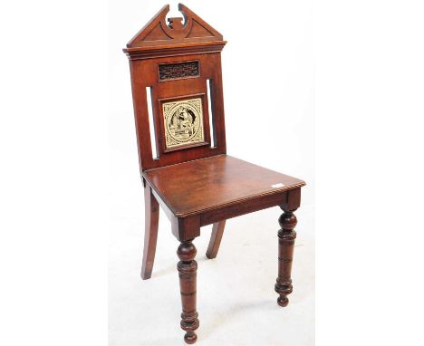 A Victorian 19th century mahogany and tile back hall chair. The hall chair with inset Romeo &amp; Juliet classical inset tile