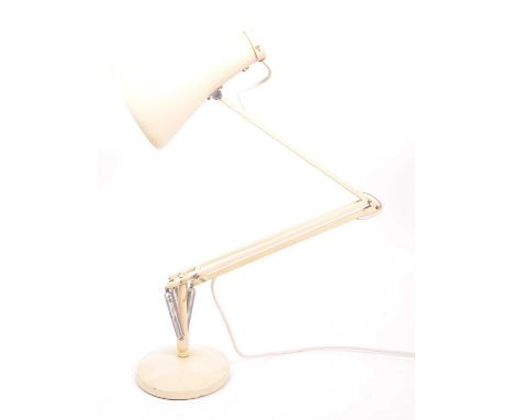 Herbert Terry - Anglepoise -  A mid 20th century Anglepoise Herbert Terry adjustable table desk lamp. The lamp having a round