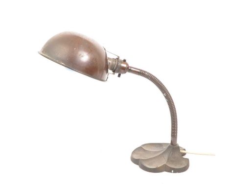 A 20th century industrial gooseneck desk lamp. The lamp raised on a cast metal base, with adjustable gooseneck arm. Featuring