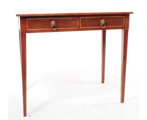 An early 20th century Edwardian mahogany console / side table. The table raised on tapered legs, with a pair of drawers to th