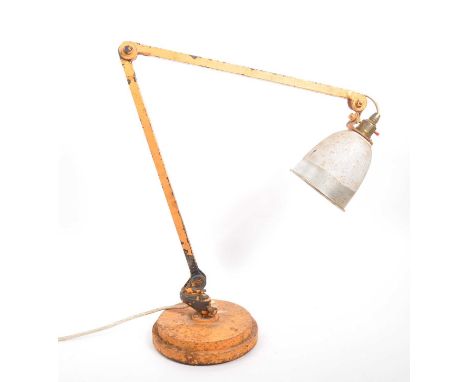 A mid Century industrial metal orange chrome anglepoise lamp light on weighted circular base with adjustable arm and conical 