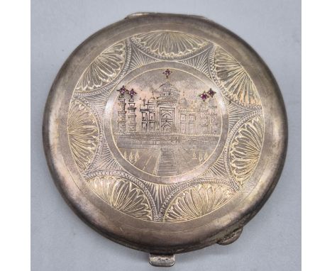 Antique Indian Sterling silver compact, engraved with the Taj Mahal fitted with ruby stones. [7.5cm diameter] [93.45grams] 