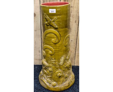 Art Nouveau Majolica green glazed ceramic umbrella/stick stand designed with raised relief fish, wave and bird design. [59cm 