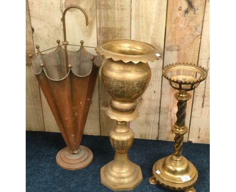 A selection of brass &amp; copper ware; Brass ware jardiniere, heavy brass church candle holder together with umbrella shaped