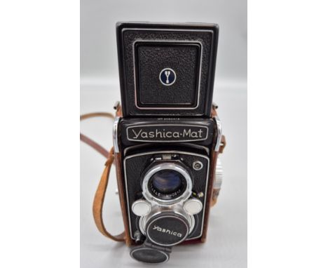 Vintage Yashica- Mat Copal- MXV Camera within a brown leather casing. 