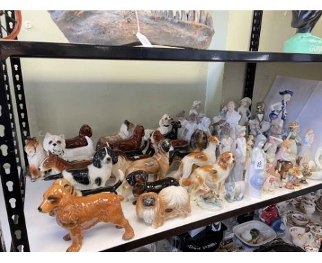 Collection of Nao, Goebel, Coopercraft dog figurines, Beswick, Royal Doulton Brambly Hedge, etc.