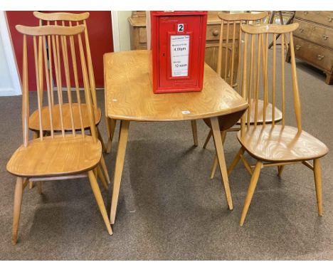 Vintage Ercol elm drop leaf dining table and four Ercol Goldsmith dining chairs.