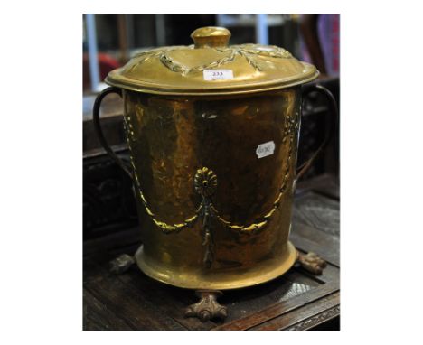 An Art Nouveau brass coal box and cover, 37.5 cm high