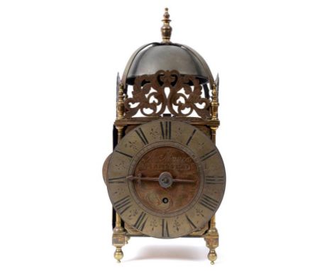 A brass lantern clock, the dial signed Thos Moore, Melford, the chapter ring with Roman numerals, fitted a single fusee movem