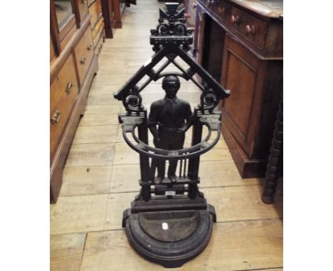 A Victorian style cast iron stickstand, in the form of a cricketer, 37 cm wide   Condition report  Report by MWThe overall he
