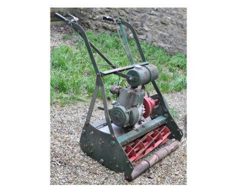 A vintage lawn mower, with a roller, and four other lawn mowers (5) 