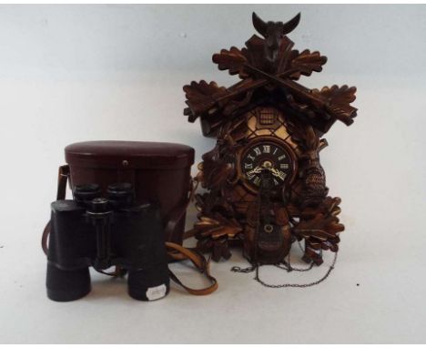 A pair of Carl Zeiss Jena 10x50 W binoculars, cased, a cuckoo clock, three other clocks, assorted silver plate and items (qty