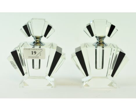 A pair of Art Deco style glass scent bottles and stoppers, 12 cm high (2)   Condition report  Report by GHReproduction pieces