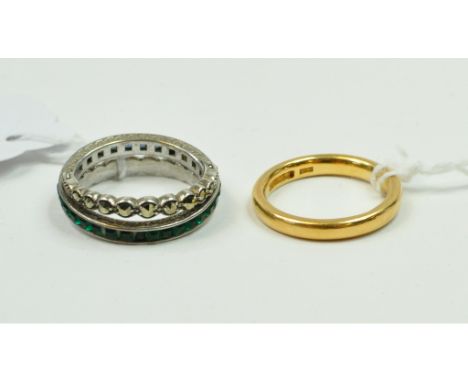 A 22ct gold wedding band, approx. 5.1 g, approx. ring size K, and a silver coloured metal, sapphire, emerald and marcasite et