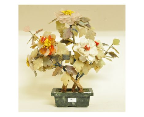 A Chinese jade and hardstone flowering tree, in a rectangular vase, 46 cm high