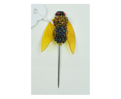 A stick pin, with fly finial