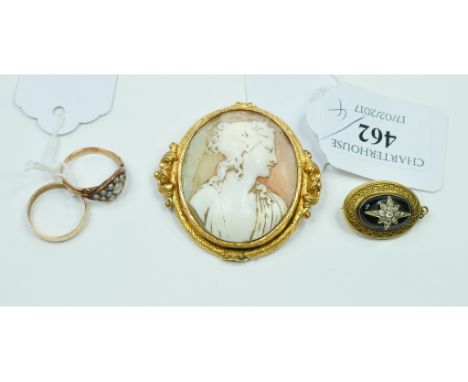 A 19th century mourning brooch, set a diamond star, a seed pearl ring, a 9ct gold wedding band, approx. 1.2 g, and a cameo br