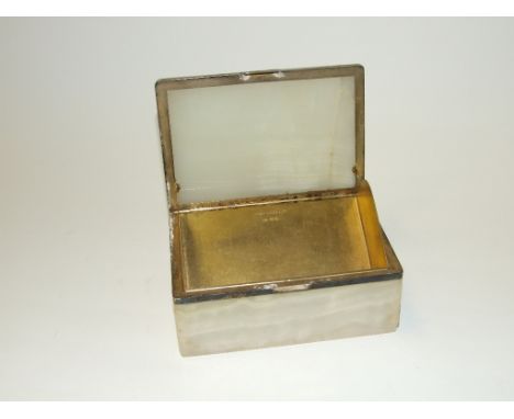 An Art Deco silver mounted onyx table cigarette box, London 1925, 15 cm wide (a.f.) 