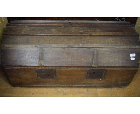 An 18th/19th century oak dome top travelling trunk, 105 cm wide