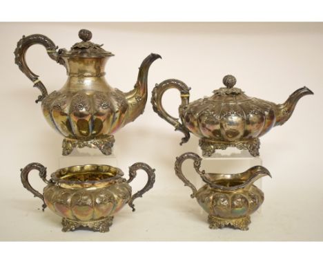 A 19th century matched silver four piece tea and coffee service, of melon form with foliate decoration, the tea and coffee po